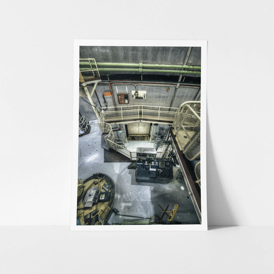 Mezzanine to Vehicle Airlock at ANSTO HIFAR, green coolant pipes run beneath a corrugated steel ceiling.