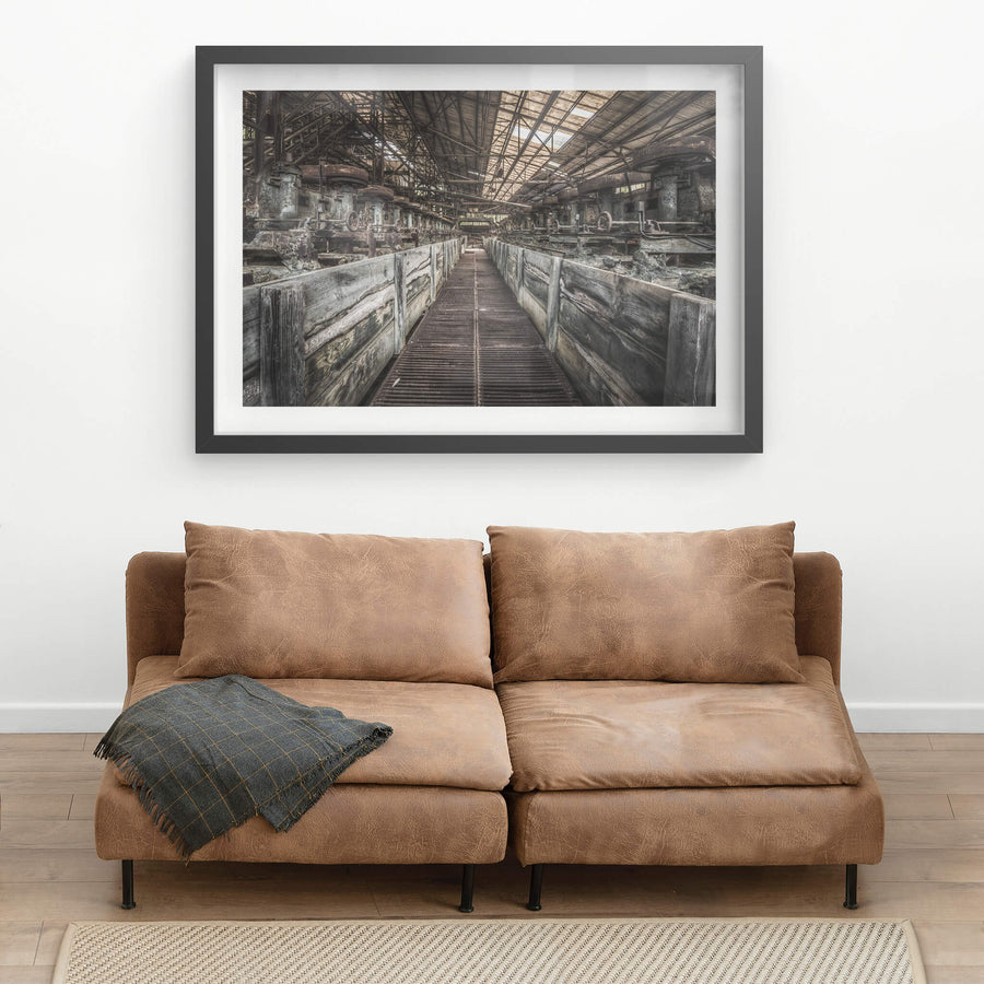 Froth Flotation Cells at Ashio Copper Mine, a narrow metal grating walkway runs between two rows of timber-lined flotation.