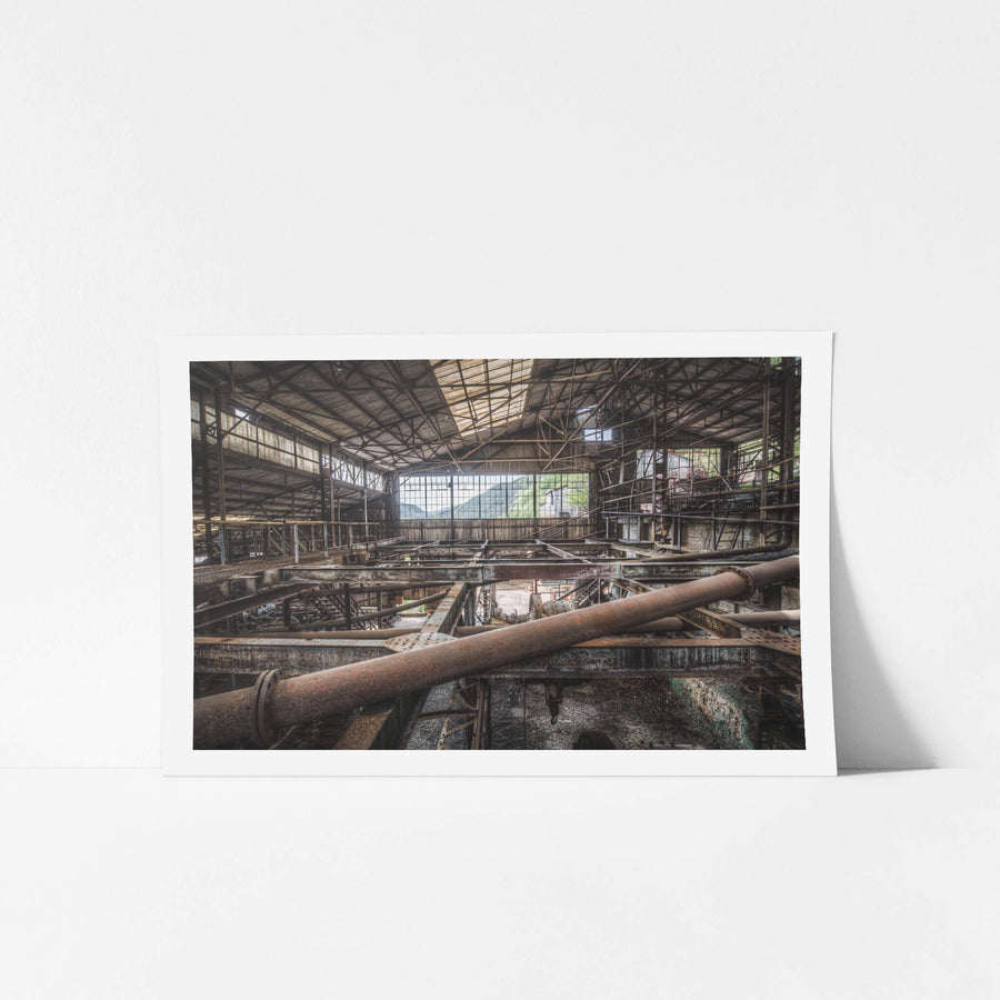 Mountain View at Ashio Copper Mine, steel trusses and heavy pipework fill the interior of a vast processing shed.