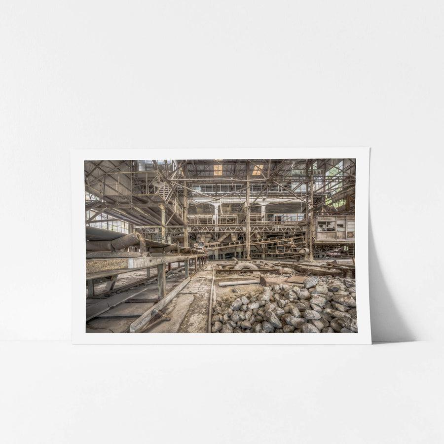 Raw Material Conveyors at Ashio Copper Mine, crushed limestone and raw ore spill across the floor of the processing hall.