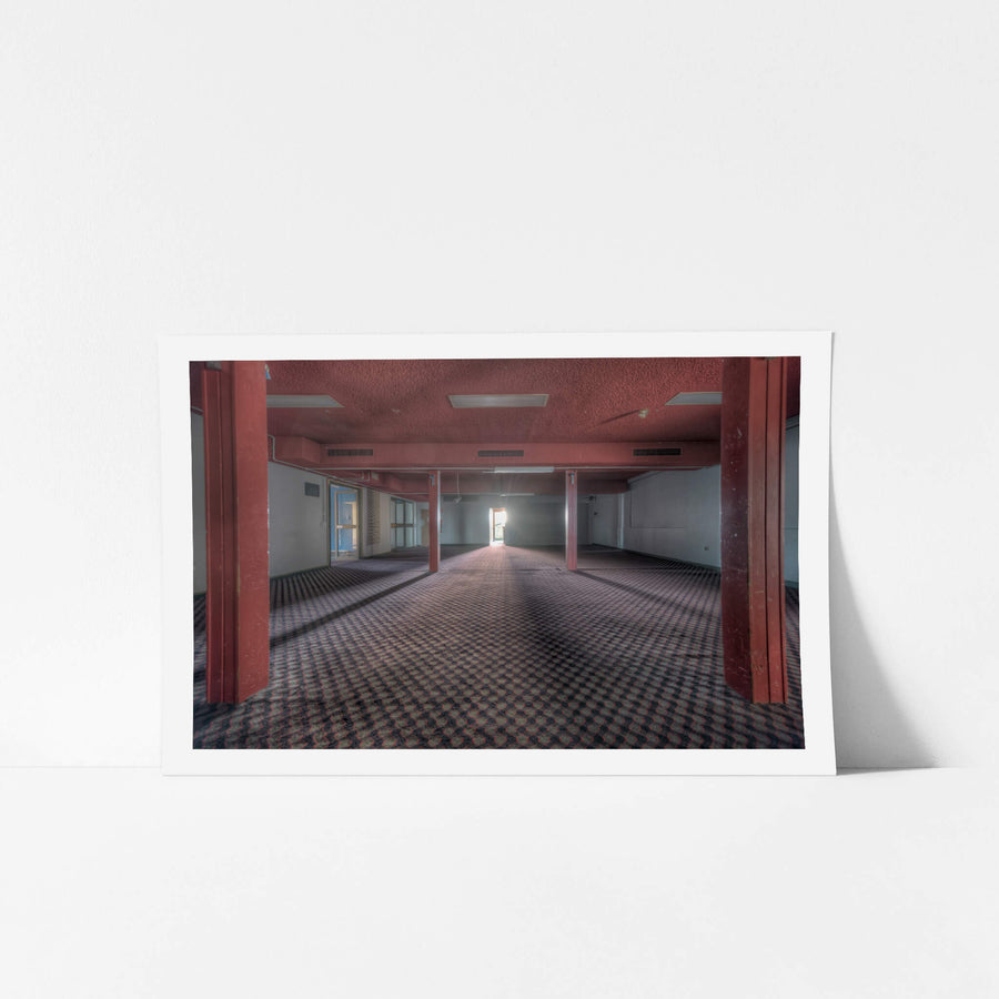 Bistro Pylons at Bankstown RSL, red columns run floor to ceiling through a wide, empty function room.