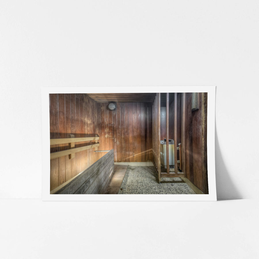 Sauna at Bankstown RSL, cedar-lined walls darken with moisture stains where the grain has swollen and split.