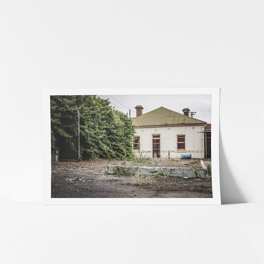 Admin at Bathurst Gasworks, a single-storey rendered building sits behind a stripped forecourt.