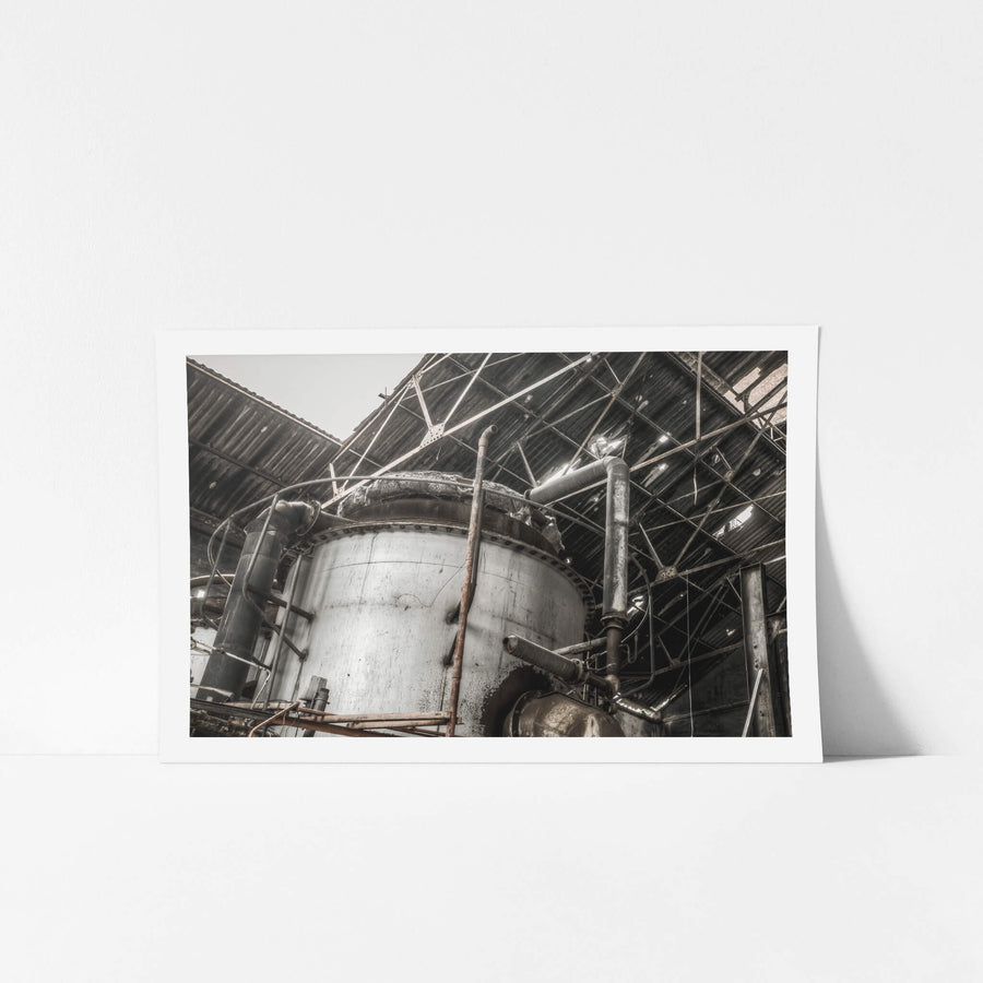 Purifier Shed Roof at Bathurst Gasworks, a large cylindrical vessel fills the frame, its steel skin streaked with grime.