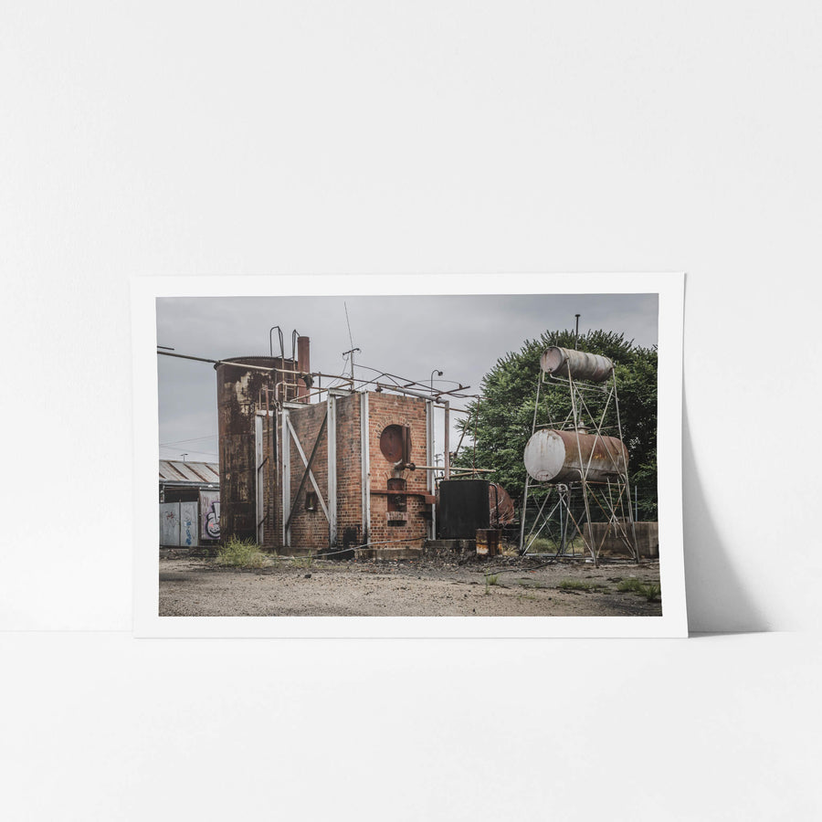 Tar Holding Structure at Bathurst Gasworks, a brick-clad boiler structure sits at the centre of the frame, its arched.