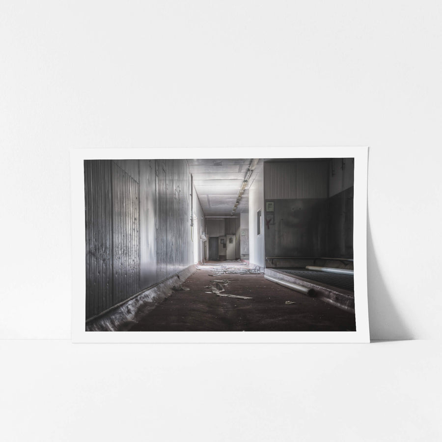 Washing Area at Blayney Abattoir, a corridor opens into a wider room where the floor sits dark and bare.