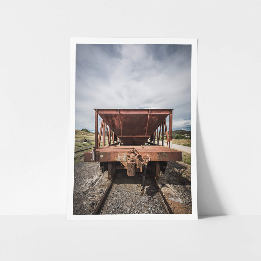 Ballast End Truck at Bombala Station, a ballast hopper wagon sits square on narrow-gauge track, shot head-on at coupling.
