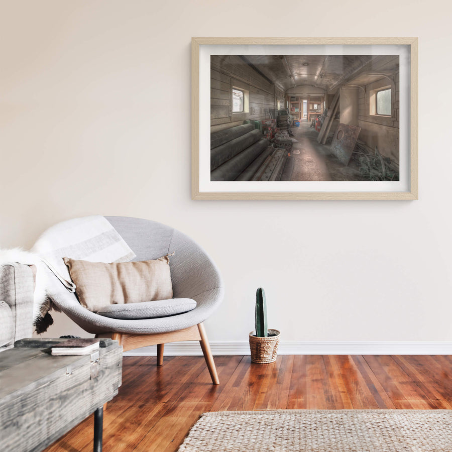 Parcel Van 3903 at Eveleigh Paint Shop, inside the carriage, timber-panelled walls curve up to a barrel-vaulted ceiling coated in grey grime.