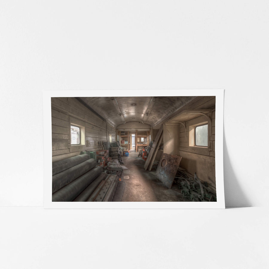 Parcel Van 3903 at Eveleigh Paint Shop, inside the carriage, timber-panelled walls curve up to a barrel-vaulted ceiling coated in grey grime.