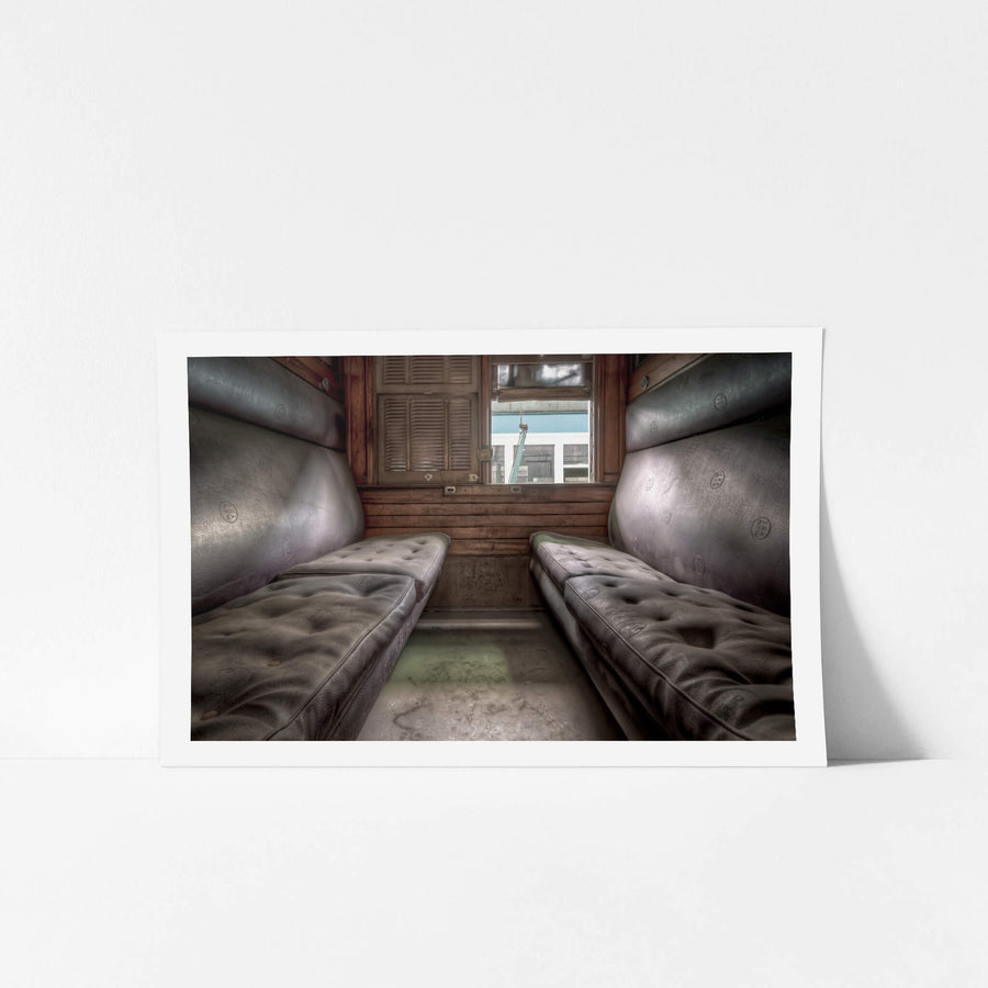 Passenger Car Compartment at Eveleigh Paint Shop, two leather bench seats face each other inside a narrow eight-passenger compartment.