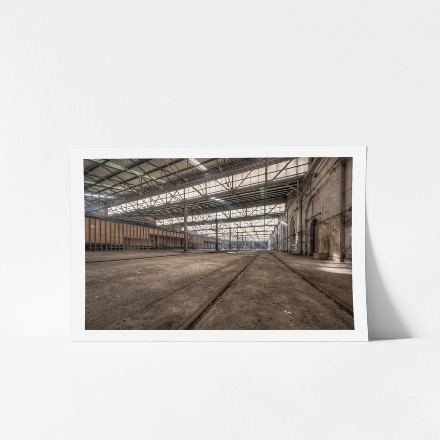 Suburban Car Workshop East at Eveleigh Paint Shop, the suburban car workshop, an extension added to the Eveleigh Paint Shop, once echoed with the sounds of rail workers overhauling Sydney’s electric train fleet.