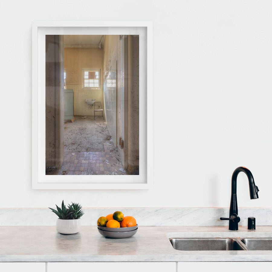 Basin at Female Ward 9 & 10, a doorway opens onto a small utility room.