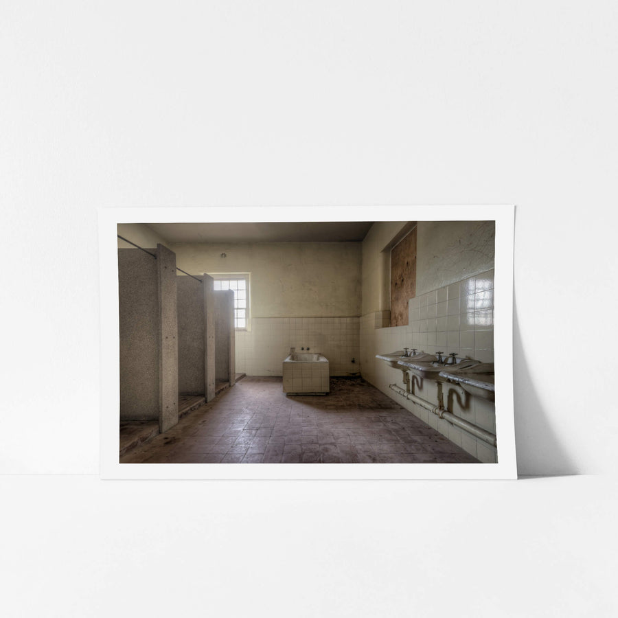 Bathroom at Female Ward 9 & 10, a communal bathroom stripped back to its fixtures.
