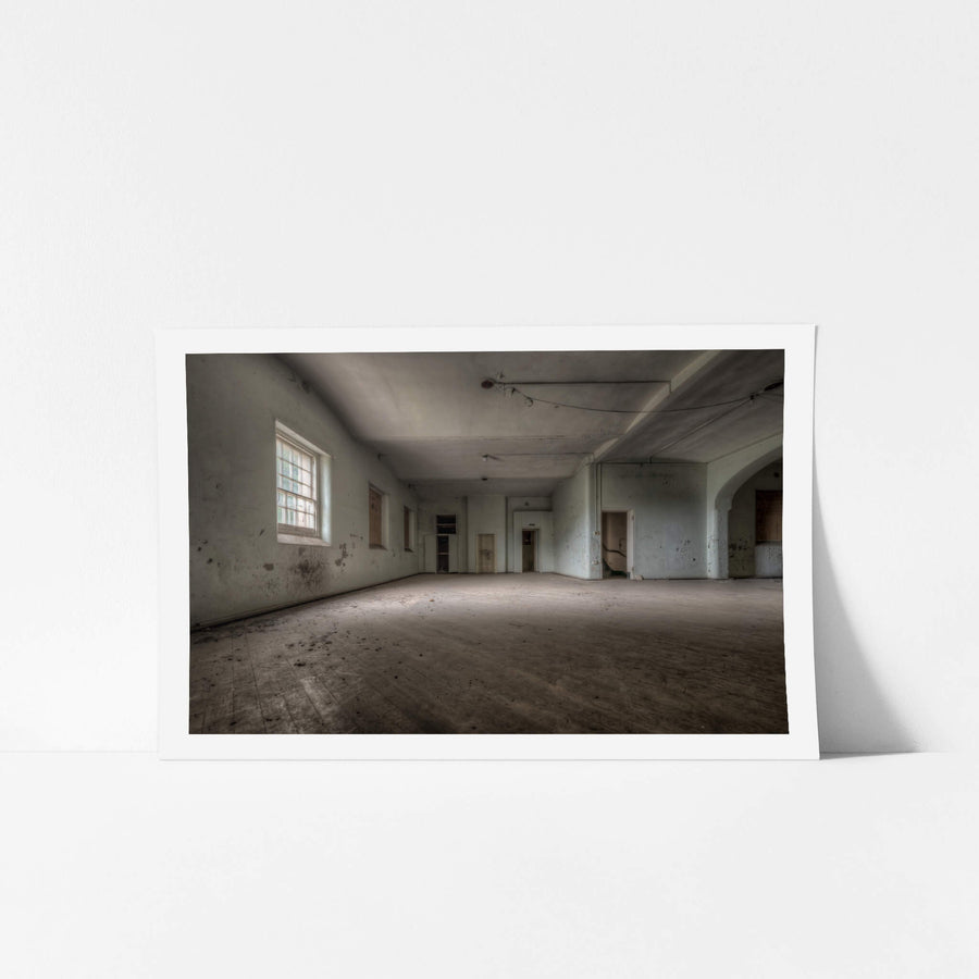 Soft Light at Female Ward 9 & 10, a single window throws pale light across a bare concrete floor.