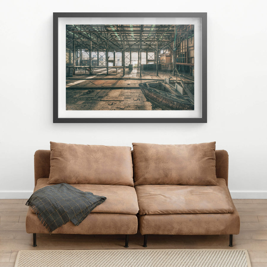 Deck at Halvorsens Boat Yard, steel columns rise from a worn timber deck inside a vast industrial shed.