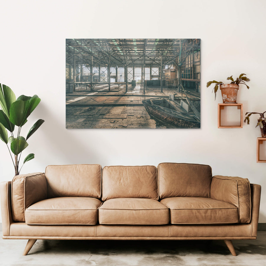 Deck at Halvorsens Boat Yard, steel columns rise from a worn timber deck inside a vast industrial shed.