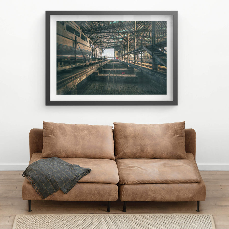 Sleeper Row at Halvorsens Boat Yard, heavy timber sleepers run in parallel lines down the centre of the shed, steel cables.