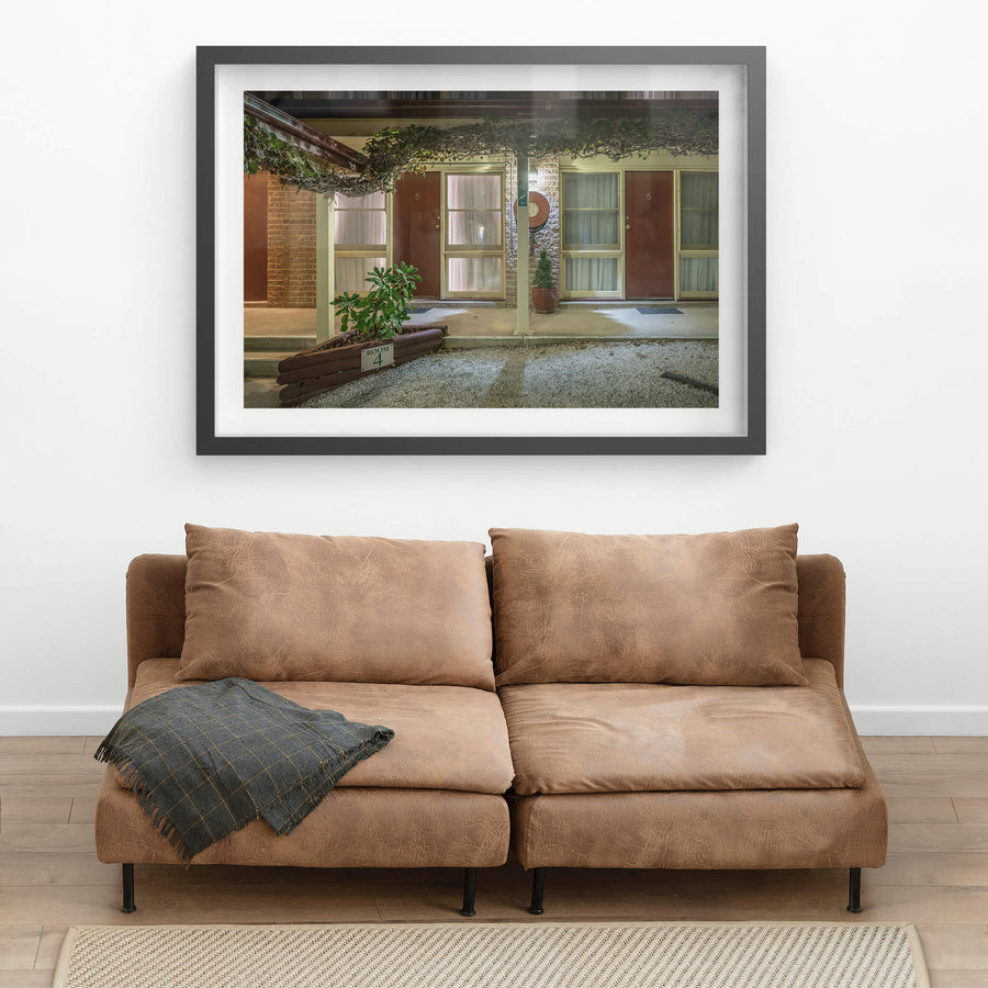 Berrima Bakehouse Motel at Hotel Motel 101, rooms 4, 5 and 6 face a gravel car park under flat fluorescent light.