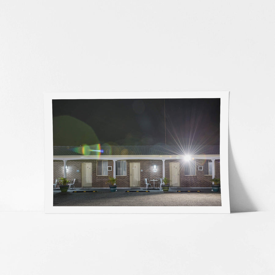 Bucaneer Motel at Hotel Motel 101, brown brick facade, single storey, three rooms numbered 4, 5 and 6.