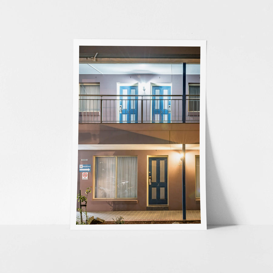 Shellharbour Village Motel at Hotel Motel 101, two storeys of rendered concrete and steel balustrade.