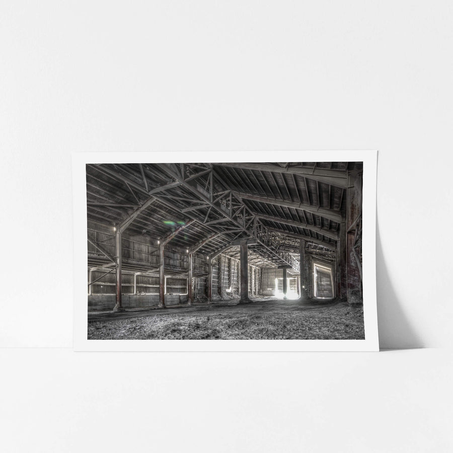 Clinker Shed at Kandos Cement Works, steel trusses span the full width of the shed, supported by heavy columns streaked.