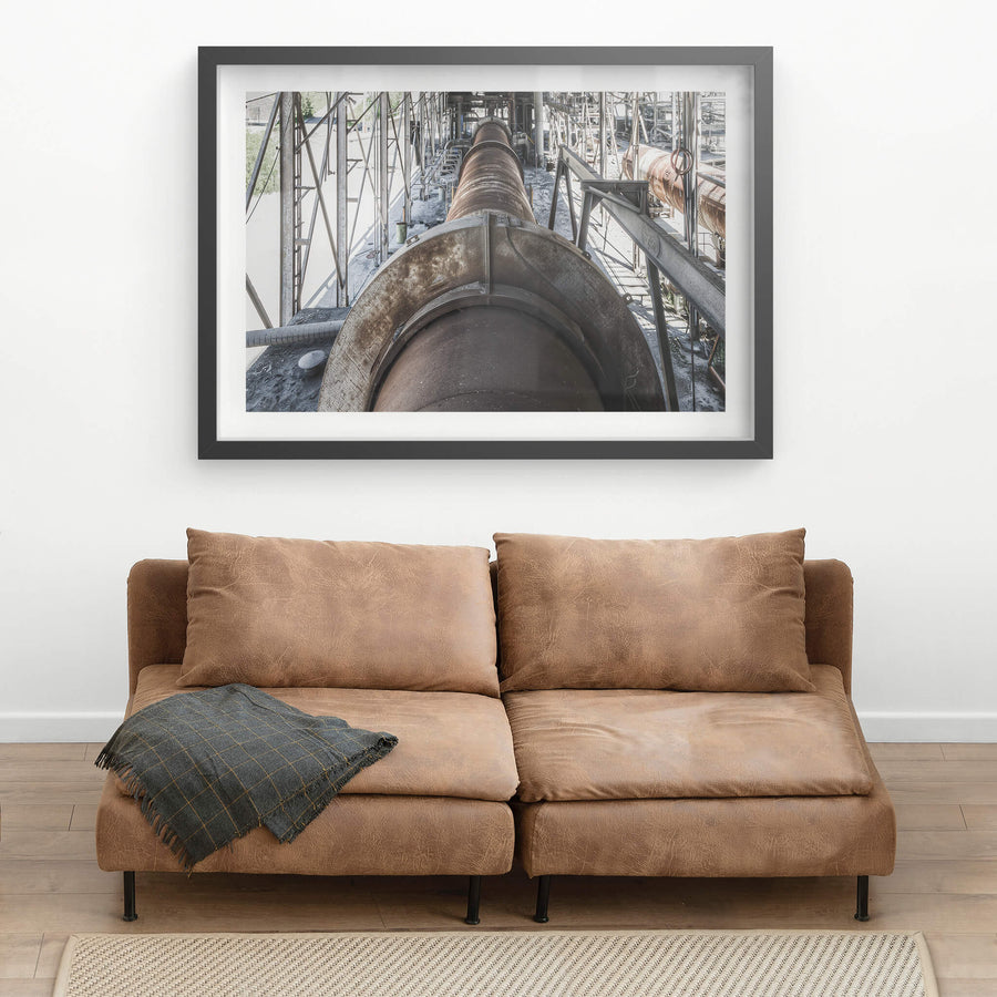 No 6 Kiln at Kandos Cement Works, a massive rotary kiln stretches deep into the frame, its steel barrel dark with heat.