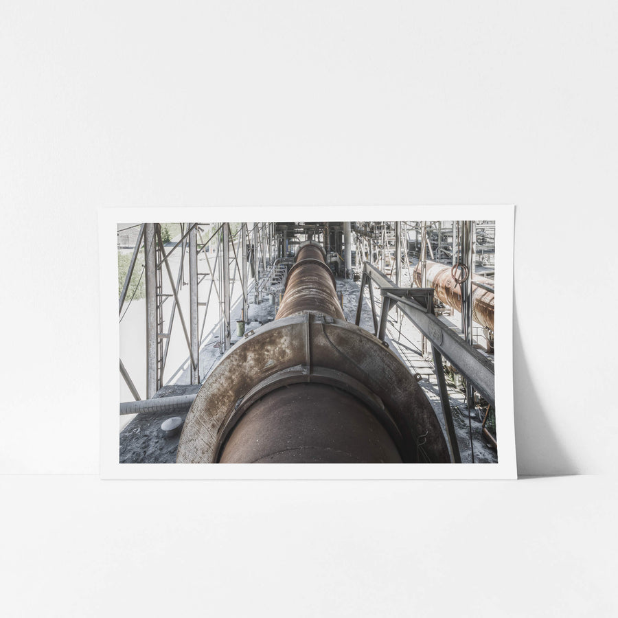 No 6 Kiln at Kandos Cement Works, a massive rotary kiln stretches deep into the frame, its steel barrel dark with heat.
