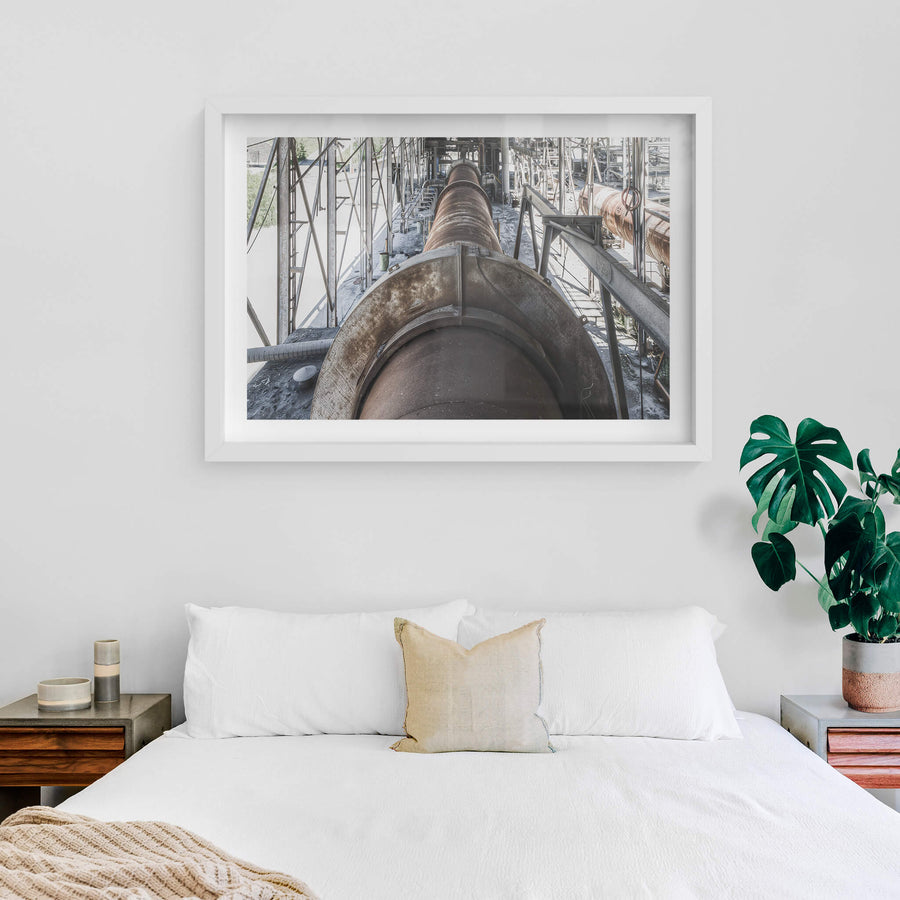 No 6 Kiln at Kandos Cement Works, a massive rotary kiln stretches deep into the frame, its steel barrel dark with heat.