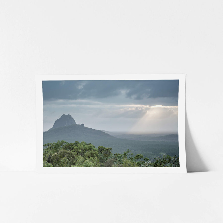 Glasshouse Sun Rays at Landscapes, sun Streaking through the clouds over the Glasshouse Mountains.