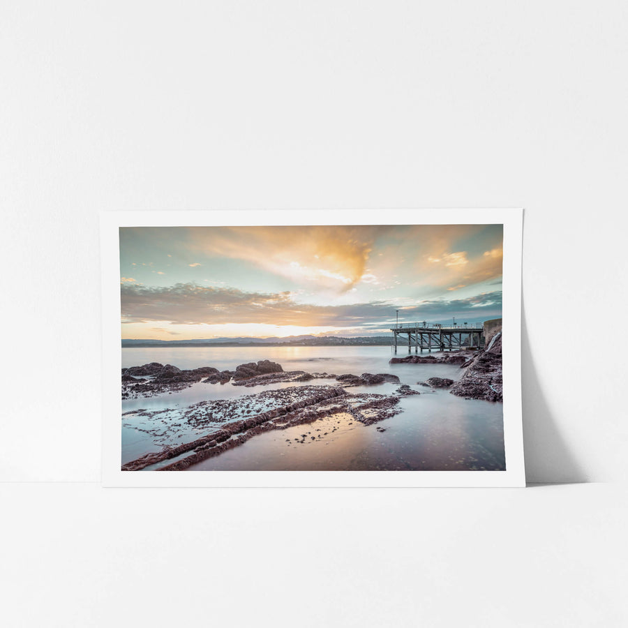 Merimbula Wharf at Landscapes, sun setting over Lake Merimbula.