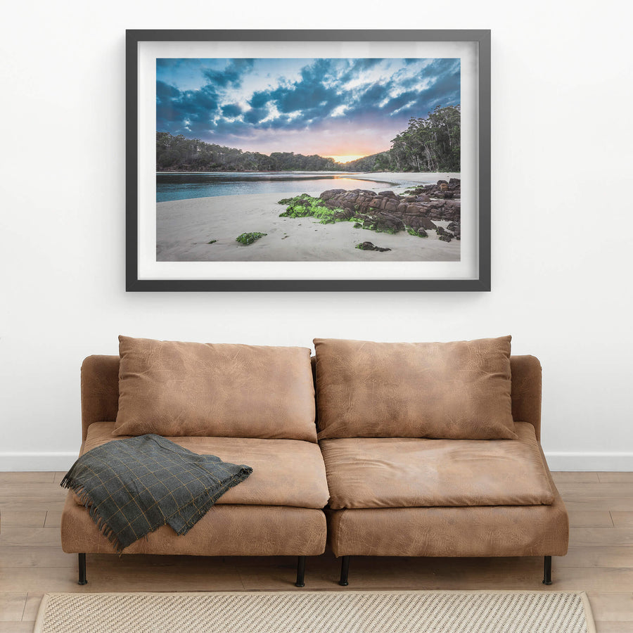 Pambula River Sunset at Landscapes, a golden sunset fades over Pambula River as the blue of the night sky sets in.