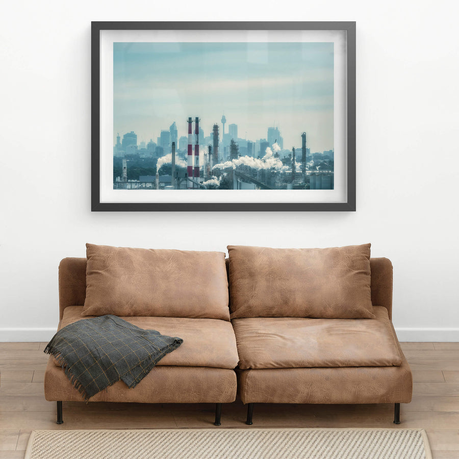 Twin Cities at Landscapes, an industrial city in front of a hazy capital city.