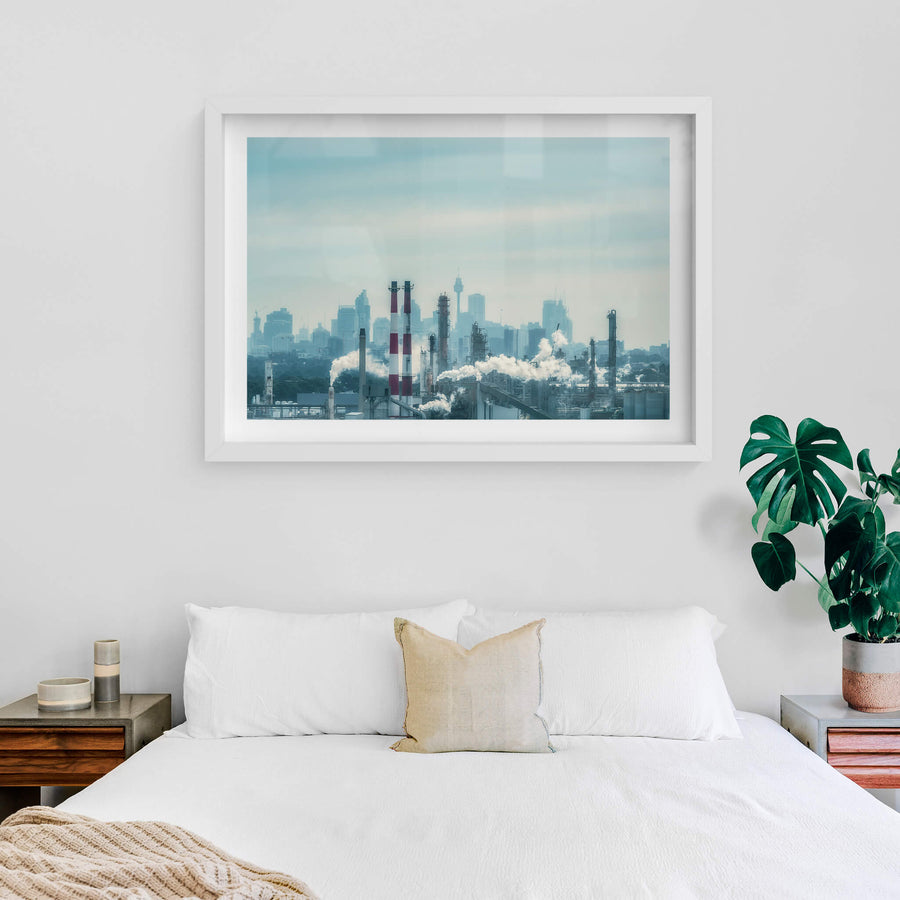 Twin Cities at Landscapes, an industrial city in front of a hazy capital city.
