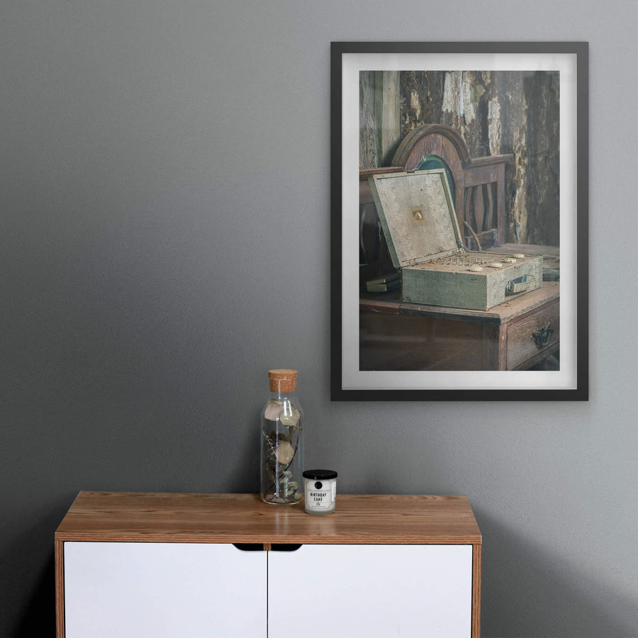 Wireless at Leichhardt House, a portable valve radio sits open on a dark timber dresser.