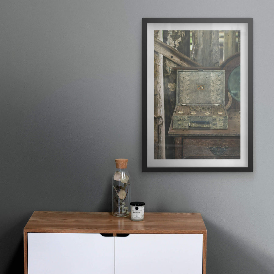 Wireless Front On at Leichhardt House, a portable valve radio sits open on a timber dresser, its lid propped back to reveal.