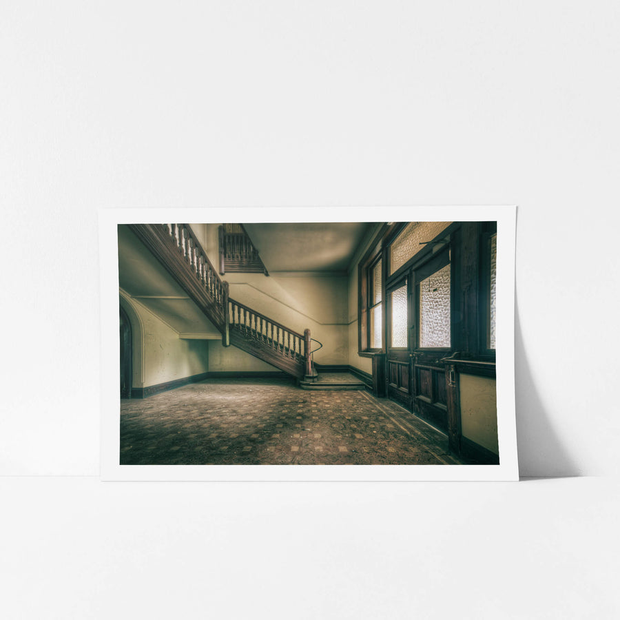 Foyer Stairs at Lewisham Hospital, a dark timber staircase climbs from the foyer, its turned balusters still intact.