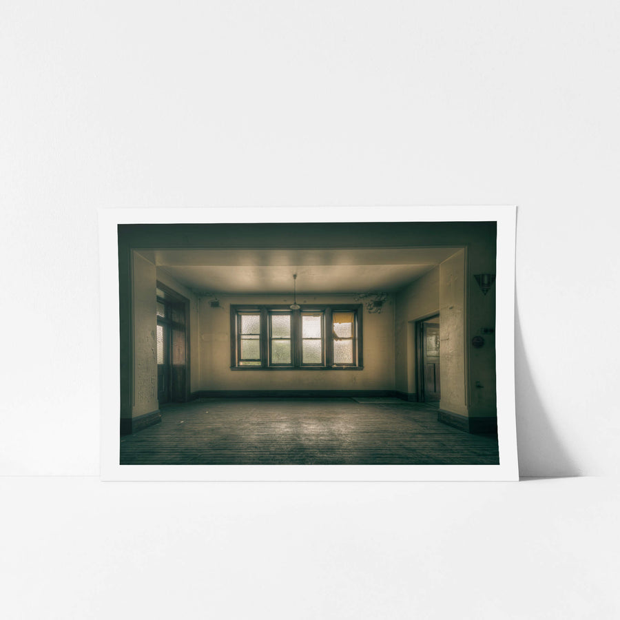 Parkview at Lewisham Hospital, four frosted glass windows fill the far wall of an empty ward room.