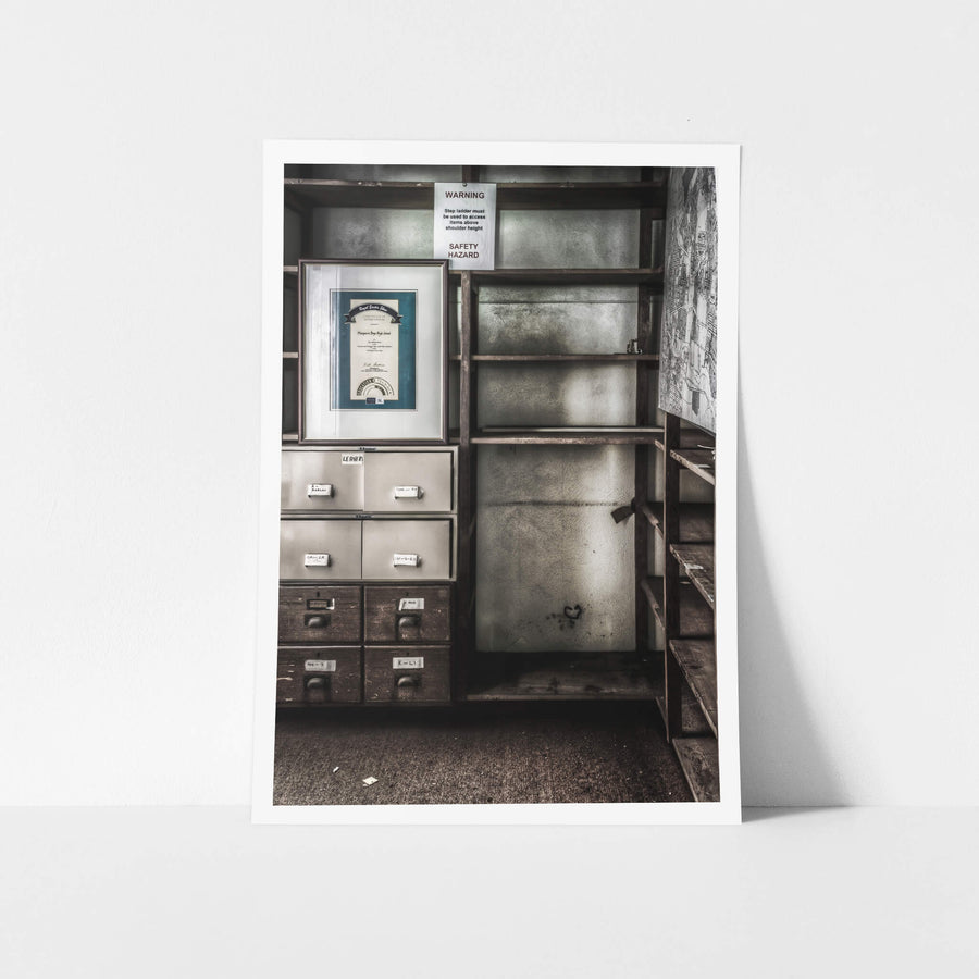 Student Records at Macquarie Boys Technology High, a filing cabinet sits against timber shelving inside the records office.