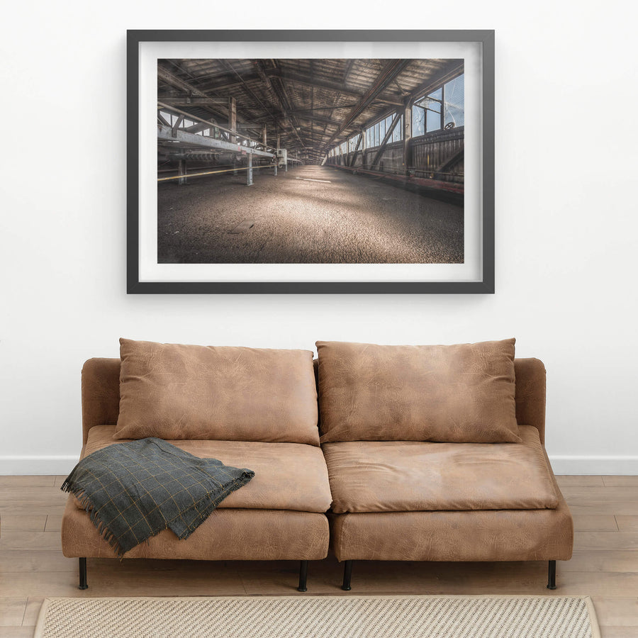 M50s at Morwell Power Station, a long covered conveyor gallery stretches into the distance, its timber-lined roof darkened.