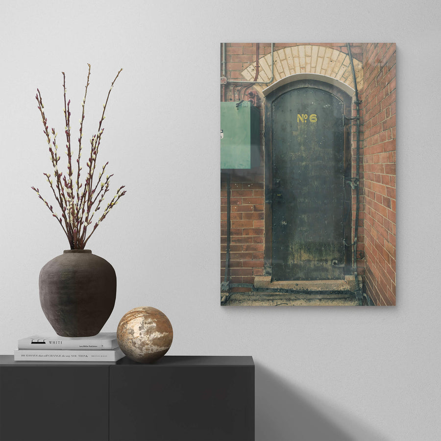 Magazine Door 6 at Newington Armory, a heavy steel door sits recessed into red brick.
