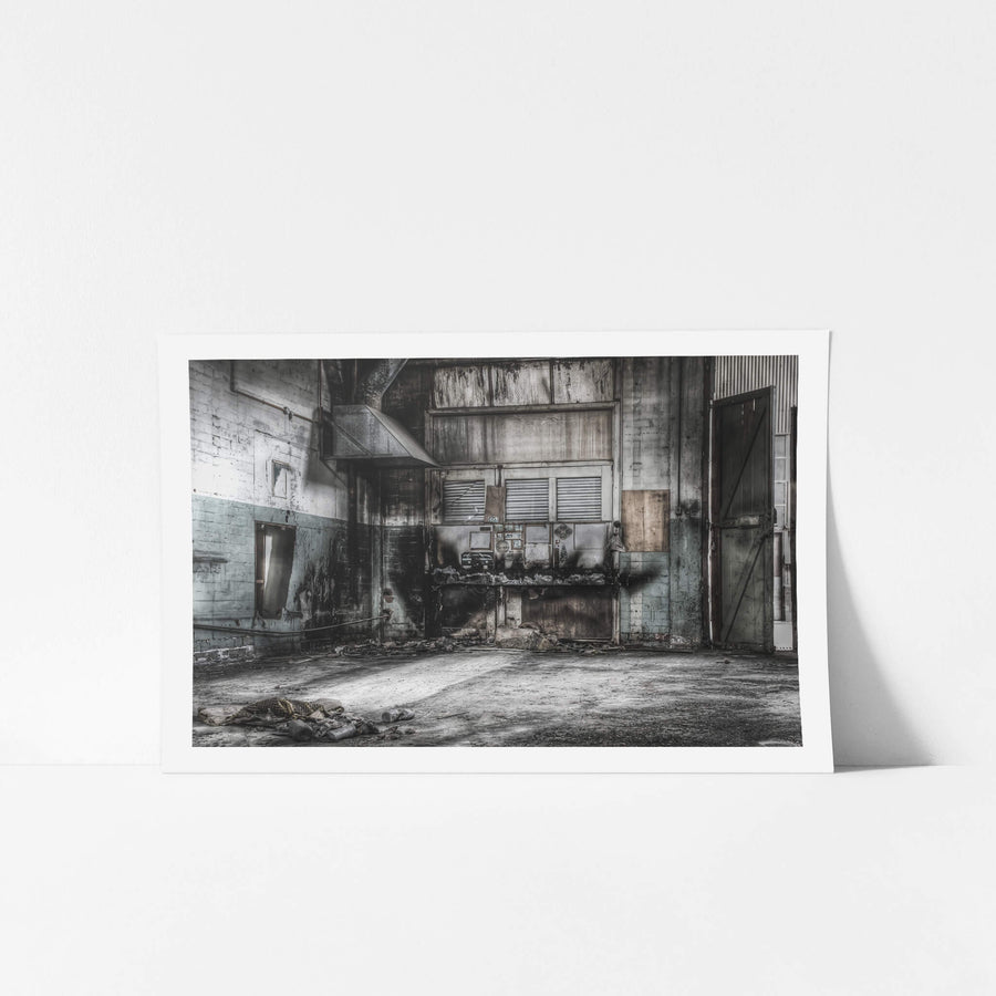 Welding Bay at O-I Glass, a high-ceilinged industrial bay with pale blue blockwork walls stained dark where heat and grease.