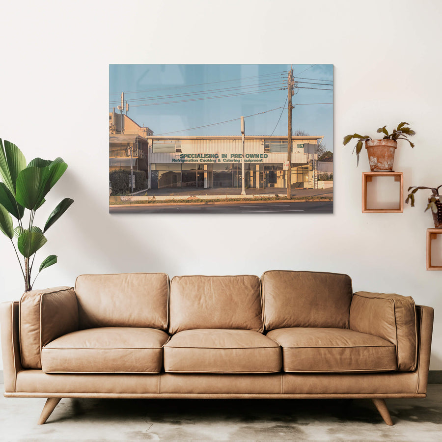 167 at Parramatta Road, a two-storey commercial building sits hard against Parramatta Road.