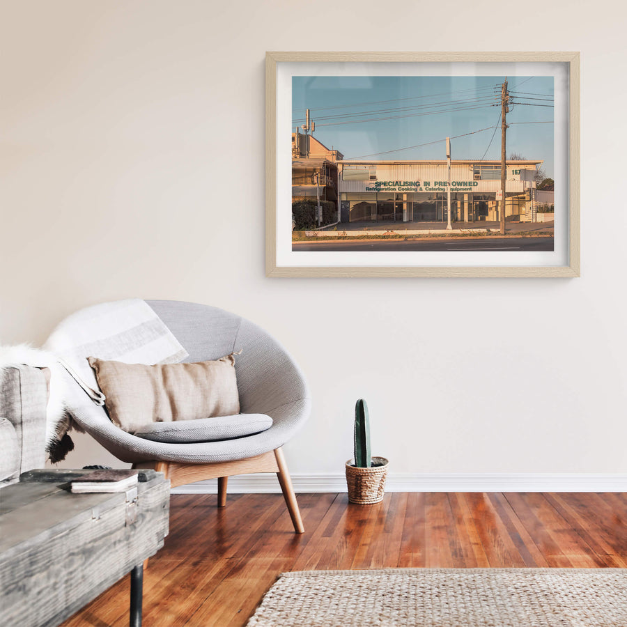 167 at Parramatta Road, a two-storey commercial building sits hard against Parramatta Road.
