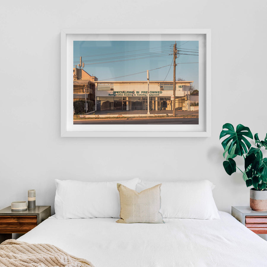 167 at Parramatta Road, a two-storey commercial building sits hard against Parramatta Road.
