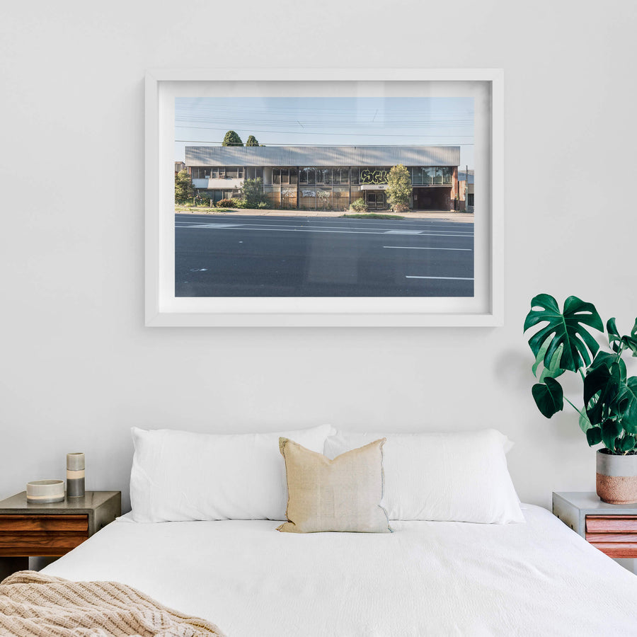 187 at Parramatta Road, a two-storey commercial building sits hard against Parramatta Road.