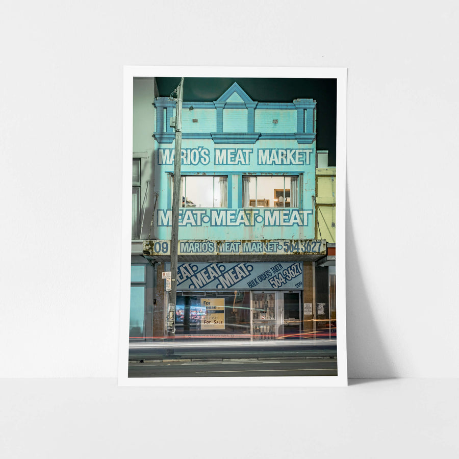 Marios Meat Market at Parramatta Road, a two-storey Victorian-era shopfront at 209 Parramatta Road, painted pale blue.