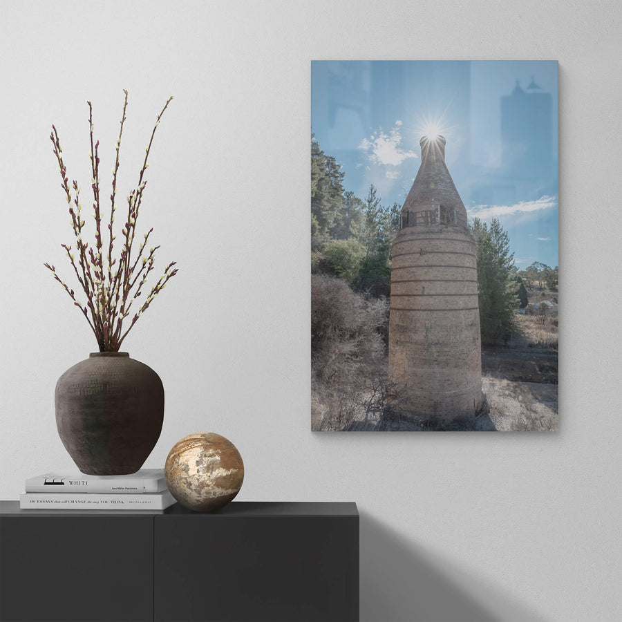 Bottle Kiln at Portland Cement Works, the cylindrical body is built from pale fired brick, banded at intervals by darker.