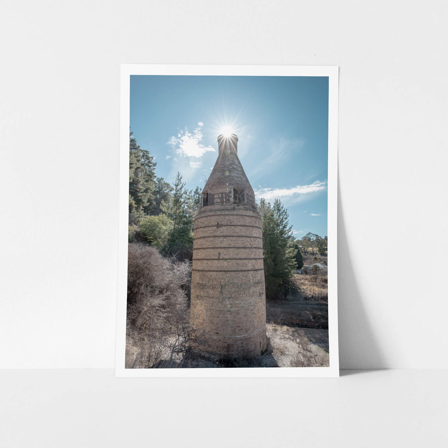 Bottle Kiln at Portland Cement Works, the cylindrical body is built from pale fired brick, banded at intervals by darker.