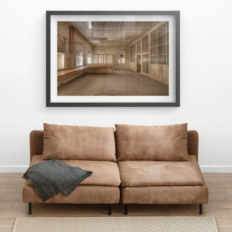 Drawing Office at Portland Cement Works, a long timber bench runs the length of the left wall, its surface bare.