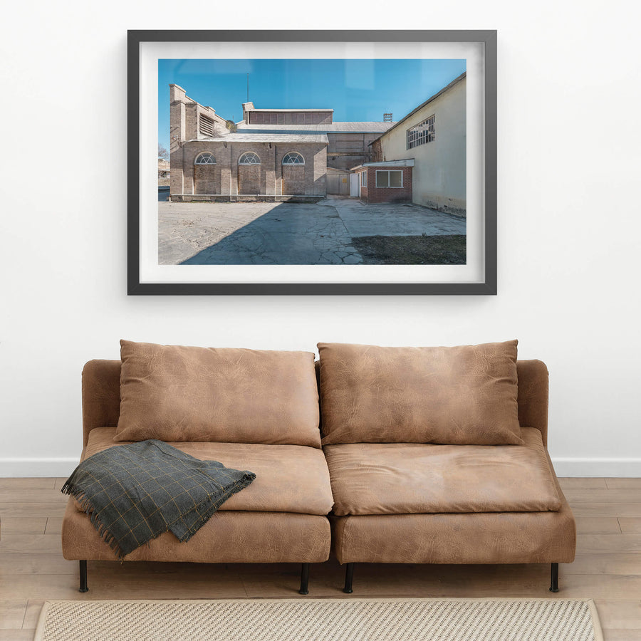 Power House Platform Side Exterior at Portland Cement Works, cream brick and pale sandstone form the rear elevation.